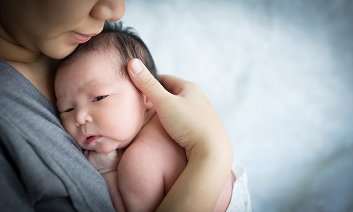 how to hold a baby
