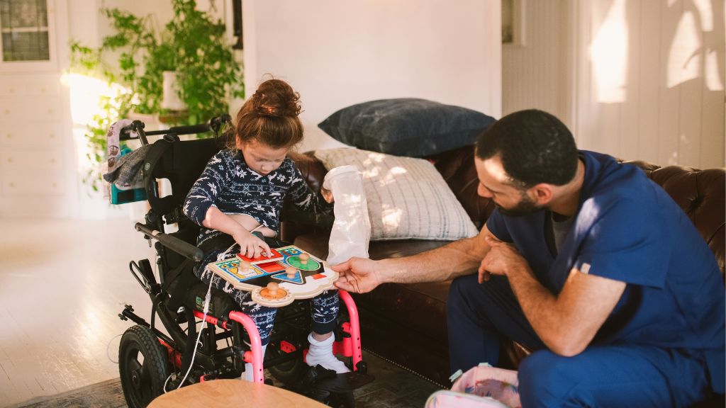 Image of a registered NDIS provider nurse assisting a physically disabled girl